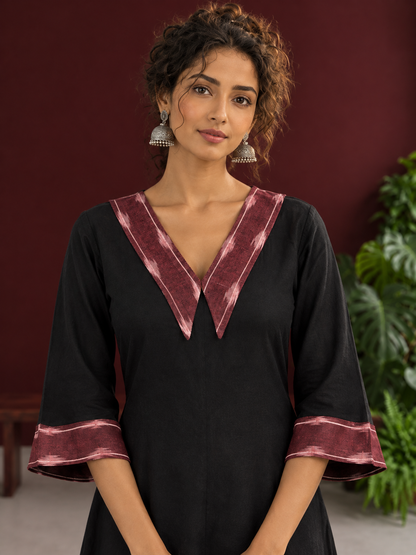 Classic Black Cotton A-line Dress with Contrast Maroon Ikat Collar and Matching Sleeve Cuffs — fabric detail