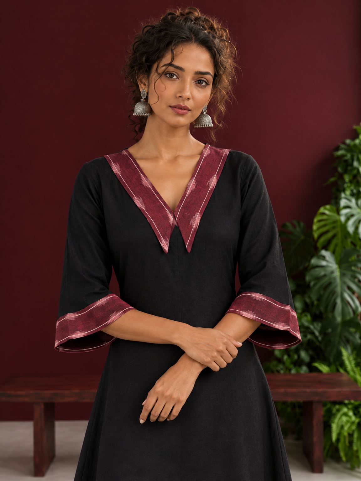 Classic Black Cotton A-line Dress with Contrast Maroon Ikat Collar and Matching Sleeve Cuffs — styled view — view 4
