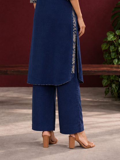 Navy blue cotton straight pants — back view