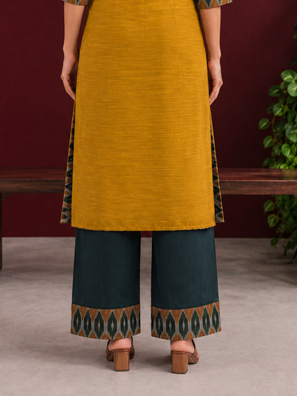Bottle green cotton silk pant with Ikat border — back view