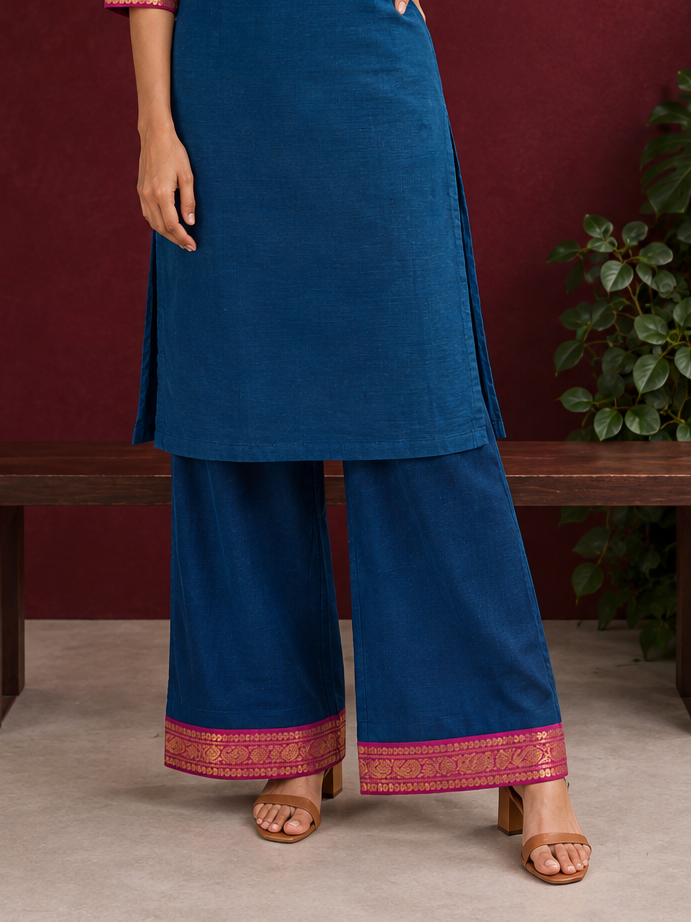 Elegant Peacock blue cotton silk pant with pink zari border — front view — view 3