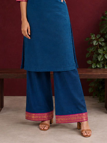 Elegant Peacock blue cotton silk pant with pink zari border — front view