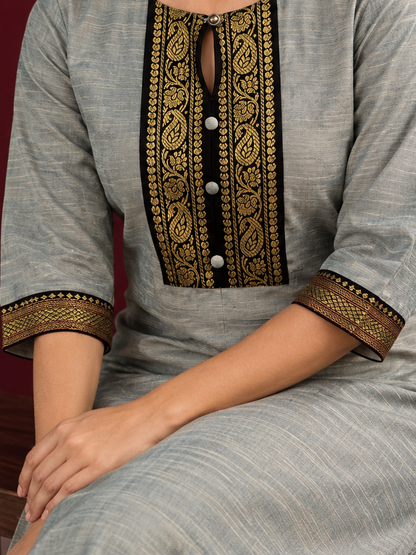 Elegant Sage Green Silk Kurta with Black zari Paisley Yoke & Contrast Sleeve Cuffs — Pant — seated detail