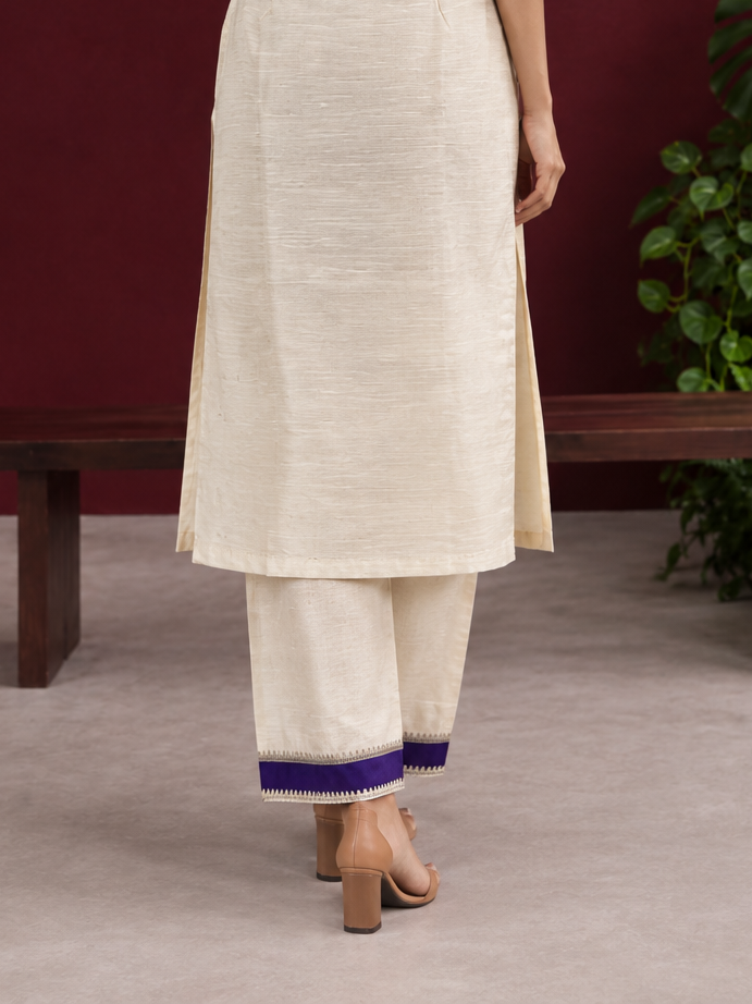 Cream Silk Straight Pant with Purple Patch Border and Lace Detailing — back view