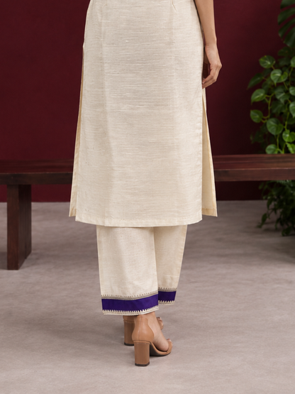 Cream Silk Straight Pant with Purple Patch Border and Lace Detailing — back view
