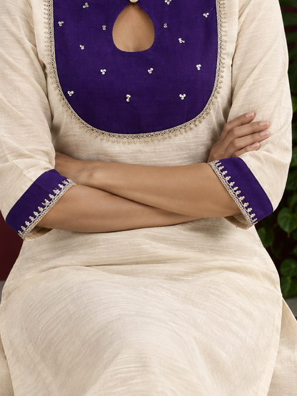 Cream Silk Straight Pant with Purple Patch Border and Lace Detailing — seated detail