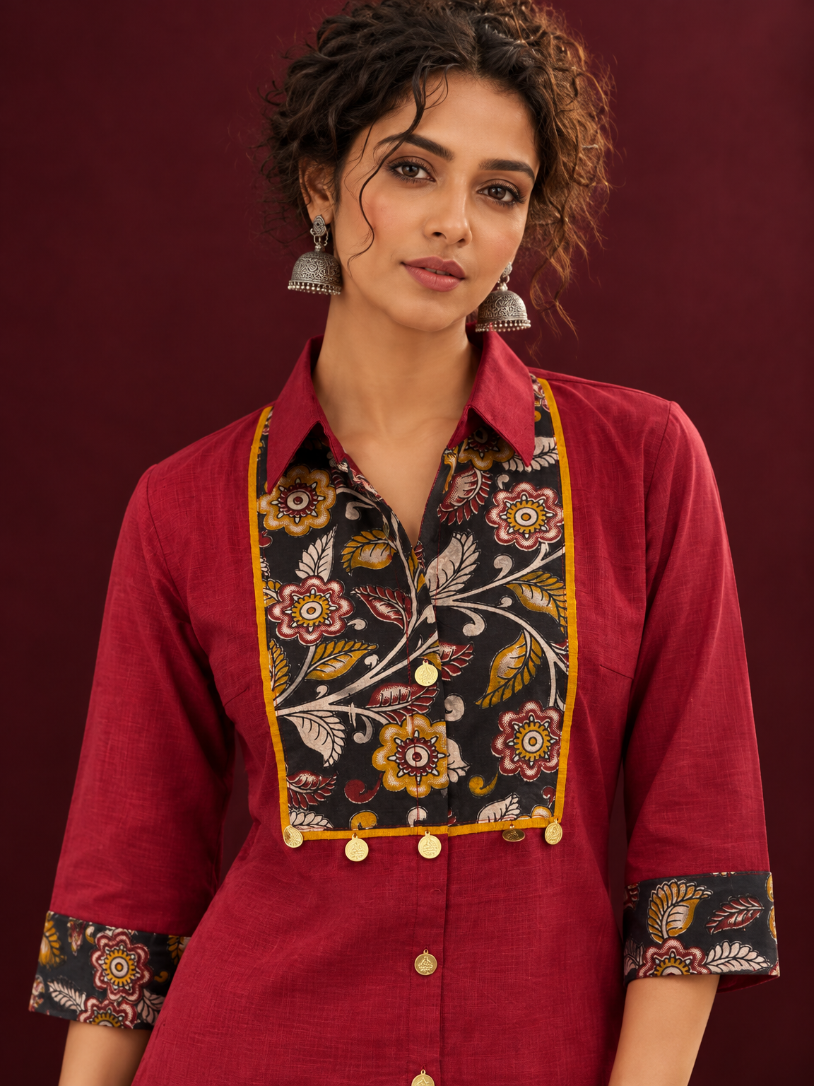 Maroon Cotton Shirt with Contrast Kalamkari Printed Yoke Panel & Sleeve Cuffs with Gold Button Detailing — fabric detail — view 3