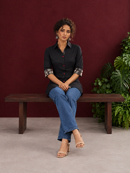 Timeless Black Cotton Shirt with Contrast Floral Print Cuffs and Maroon Button Placket — seated