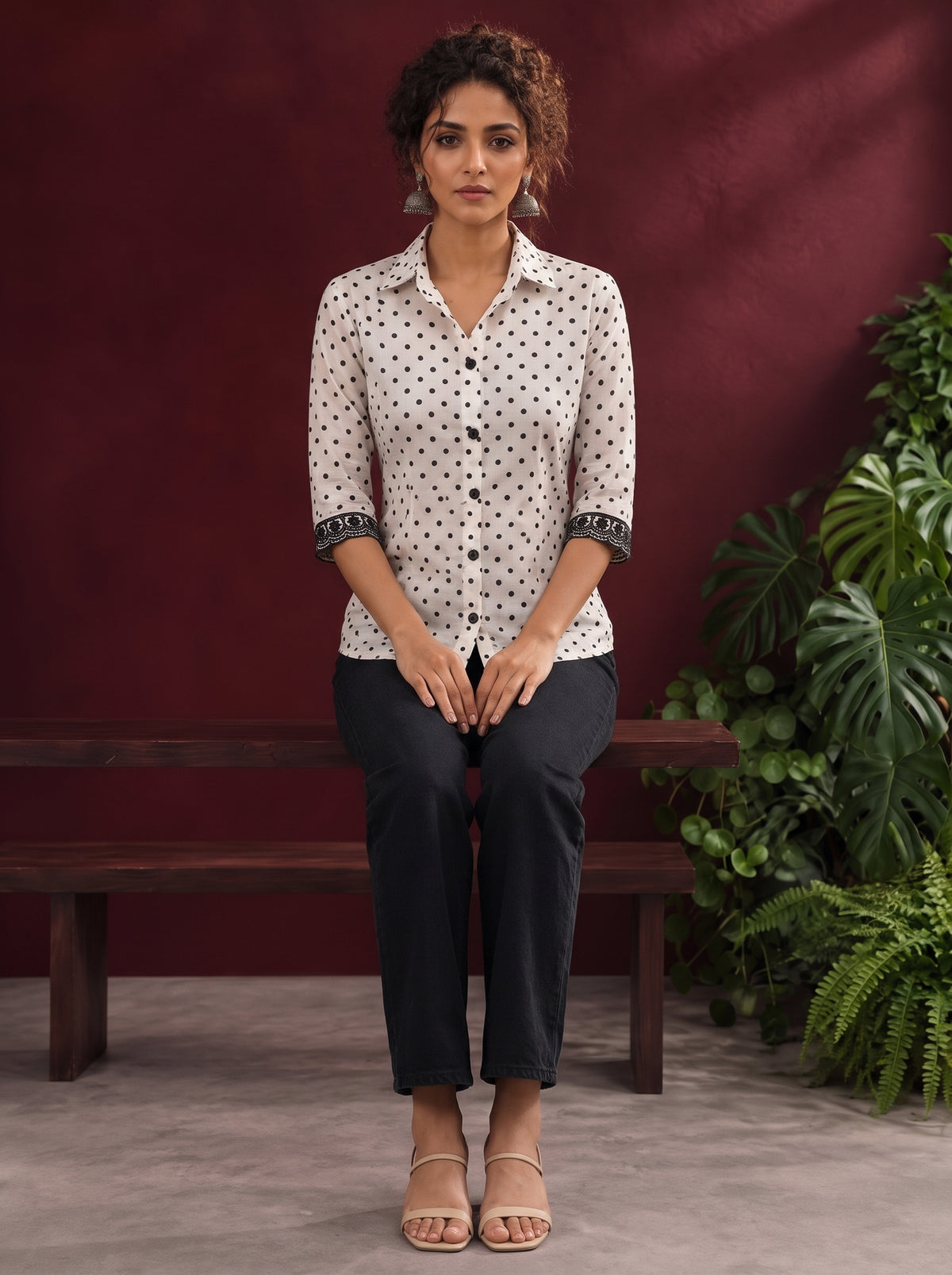 Classic White Cotton Shirt with Black Polka Dot Print and Contrast Lace Cuff Detail — seated — view 2