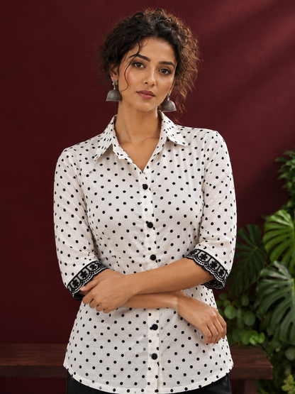 Classic White Cotton Shirt with Black Polka Dot Print and Contrast Lace Cuff Detail — styled view