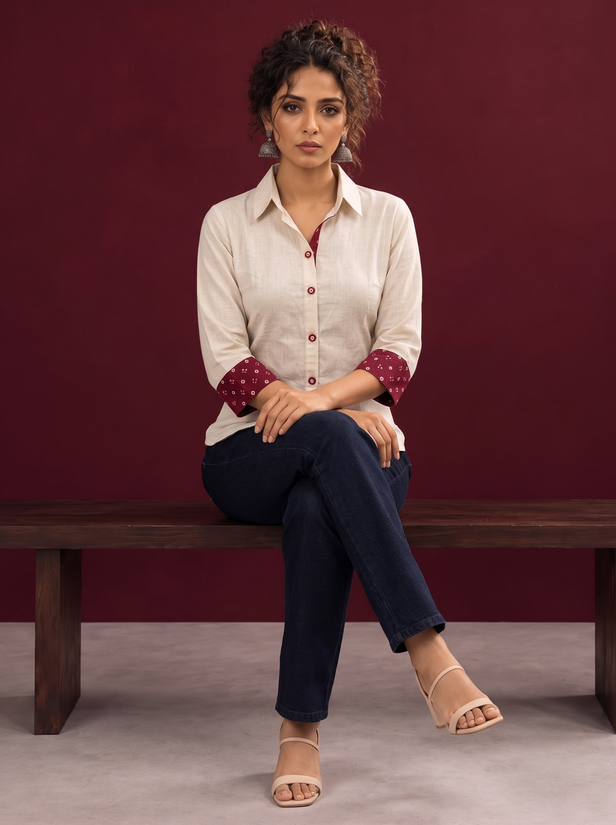 Classic Off-White Cotton Shirt with Maroon Printed Placket & Contrast Sleeve Cuffs — seated