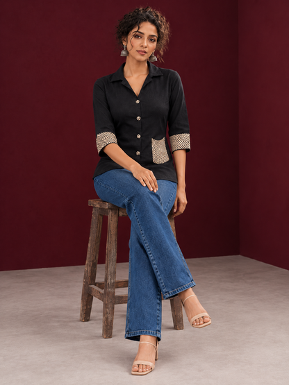 Classic Black Cotton Shirt with Contrast Ajrakh Chevron Print Cuffs & Patch Pocket Detail — seated