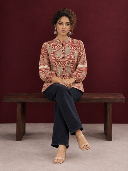 Classic Rust Cotton Shirt with Allover Maroon Print, Mandarin Collar & Lace Trim Sleeves — seated