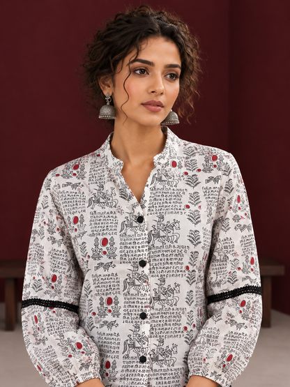 White Cotton Shirt with Warli Print, Mandarin Collar & Crochet Trimmed Full Sleeves — fabric detail