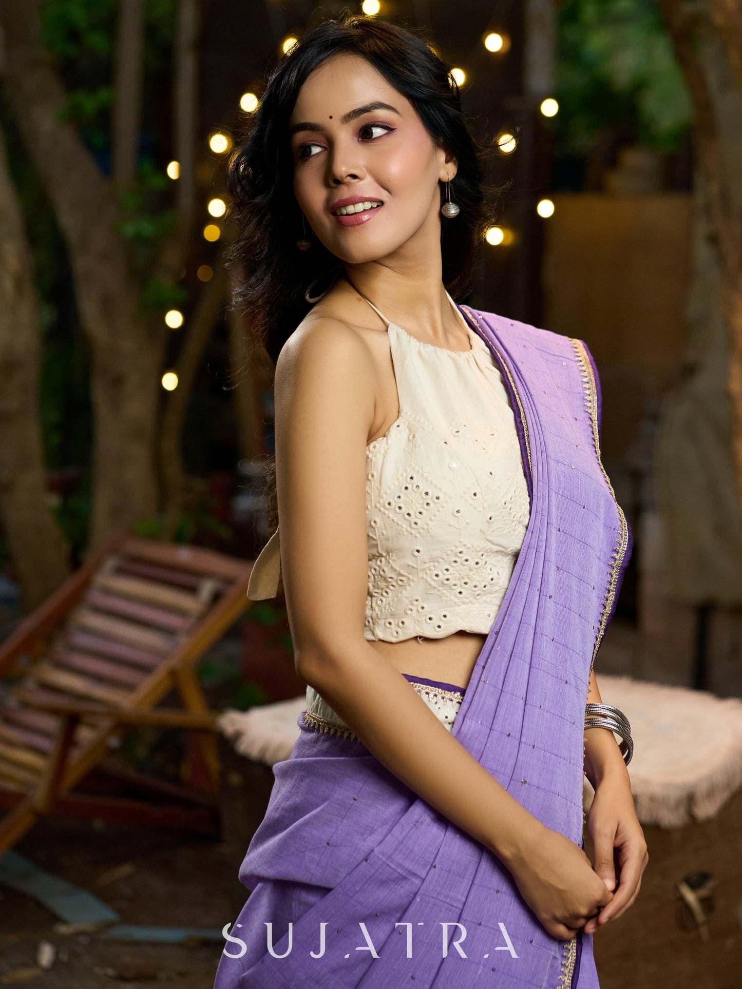 Elegant lilac cotton saree with golden accents and soft handcrafted sophistication