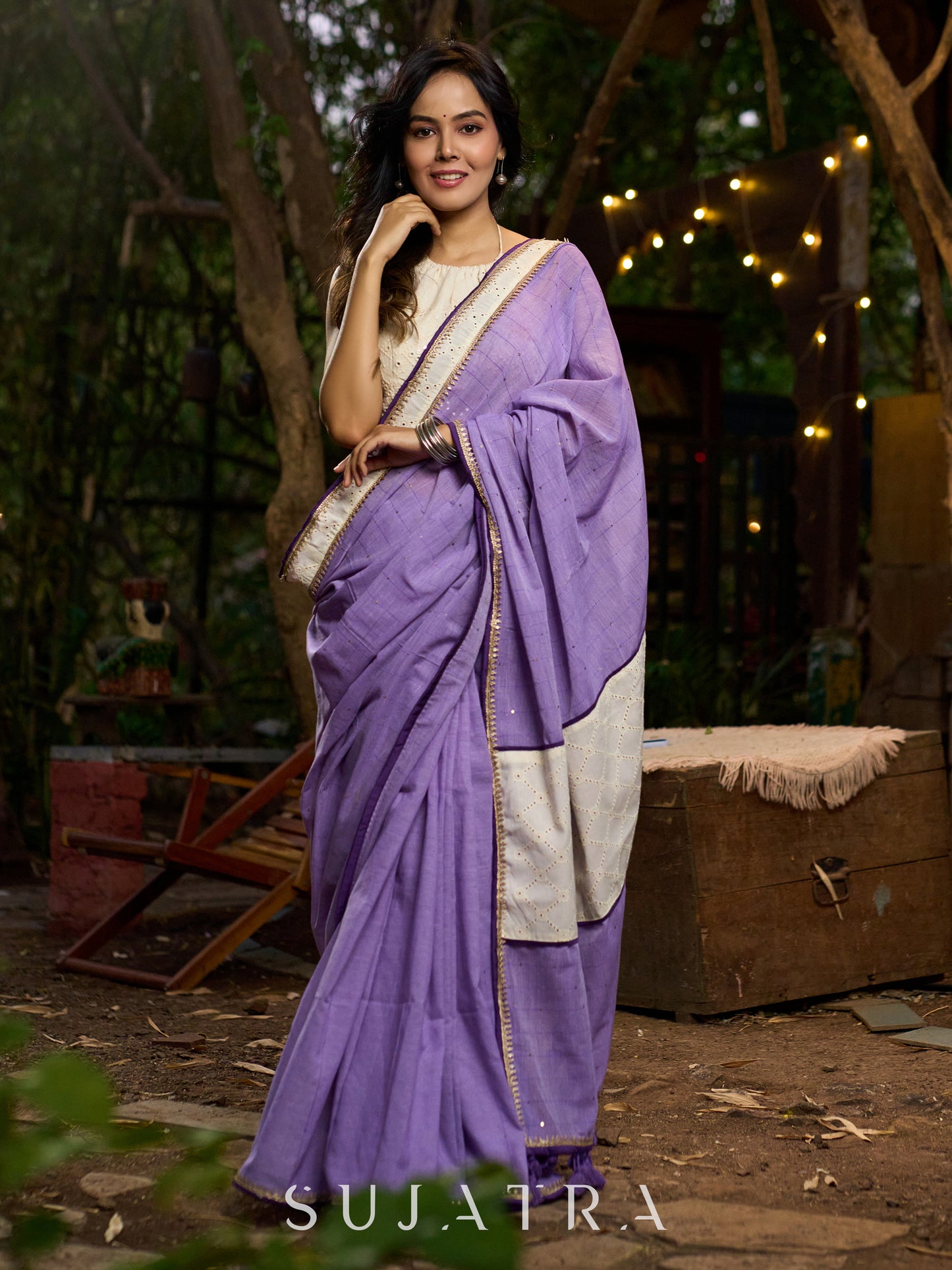 Elegant lilac cotton saree with golden accents and soft handcrafted sophistication