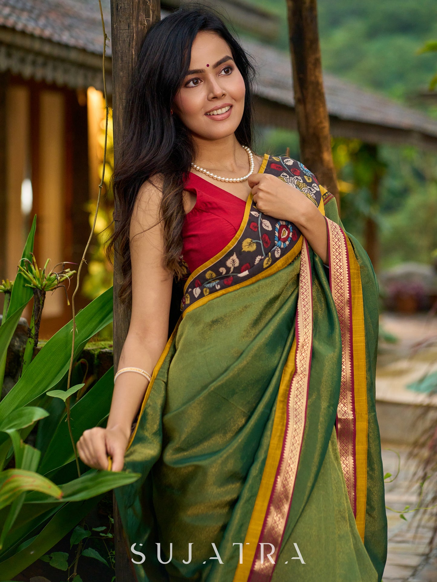 Exclusive green tissue saree with hand painted kalamkari borders & maharashtrian khun border