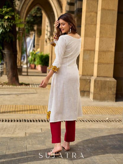 Graceful Ivory Kurta Featuring Statement Mustard Appliqué Florals on Hem & Cuffs