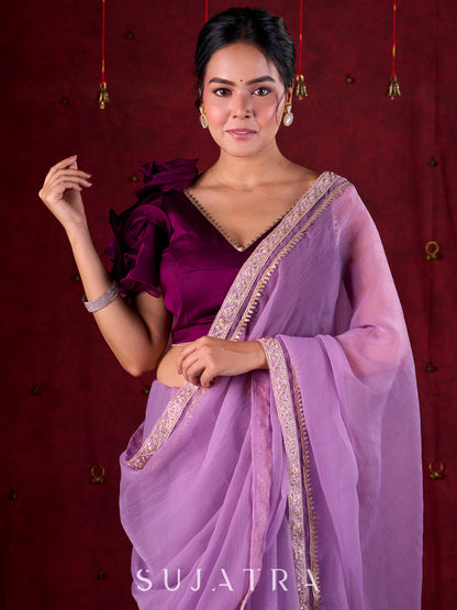 Soft Lavender Crepe Saree Adorned with Delicate Embroidered Lace Border