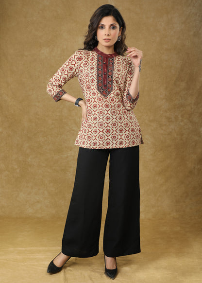 Trendy Cream Block Printed Cotton Top with Ikat & Ajrakh Detailing