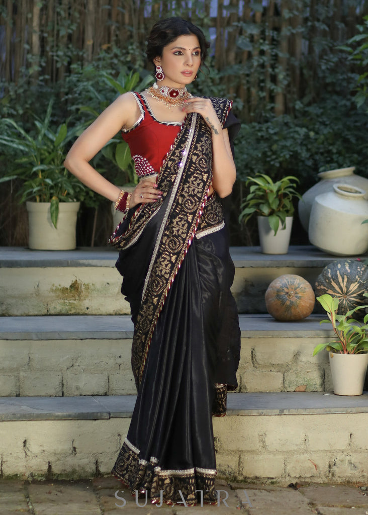 Elegant Black Modal Silk Saree with Golden Border Highlighted with Lace
