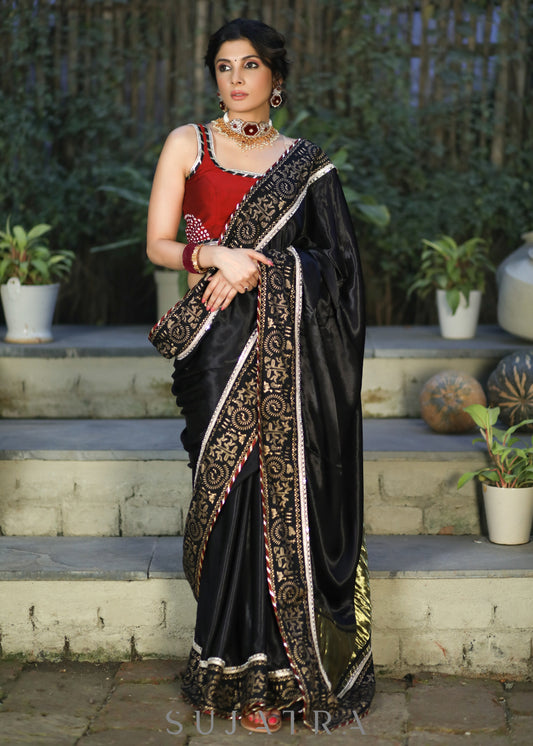 Elegant Black Modal Silk Saree with Golden Border Highlighted with Lace