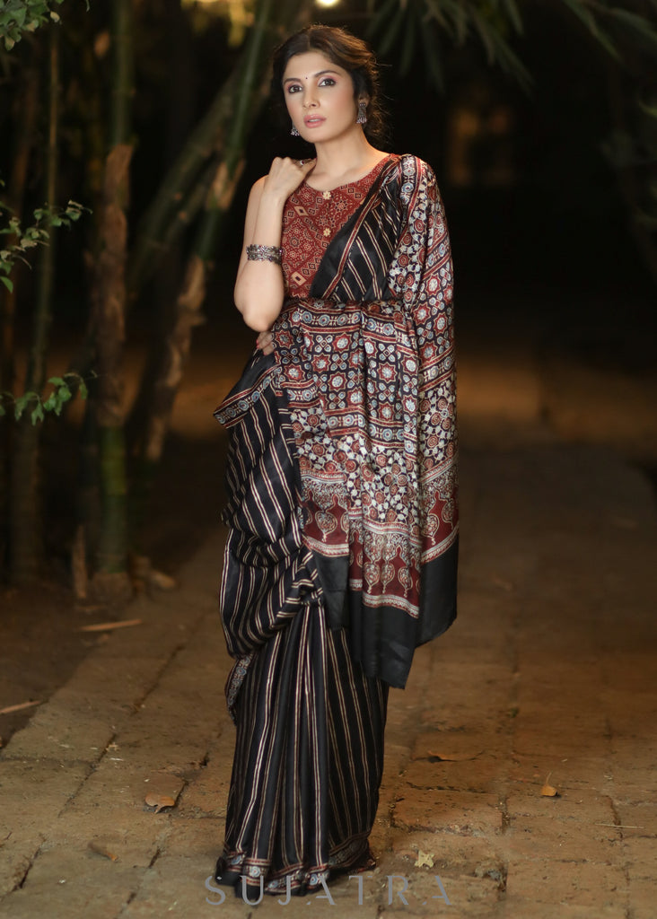 Lustrous Black Modal Silk Saree with Striped Pattern