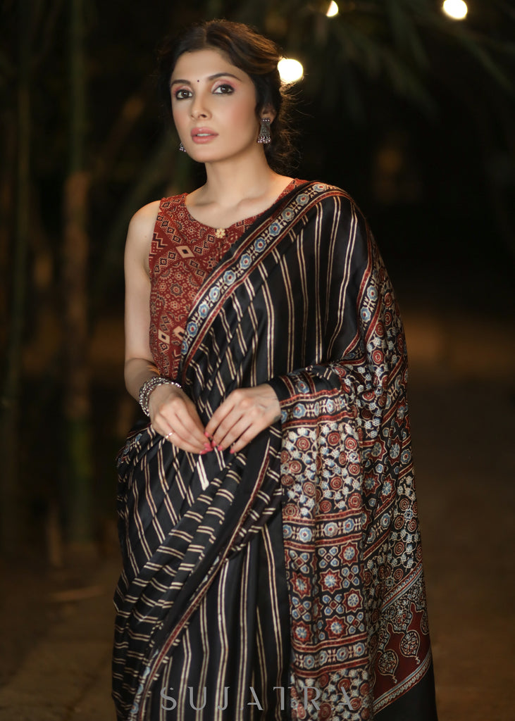 Lustrous Black Modal Silk Saree with Striped Pattern