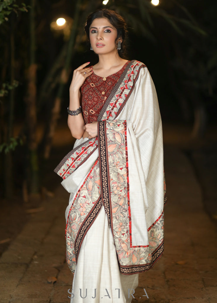Smart Cream Cotton Blend Saree with Handpainted Madhubani Border Highlighted with Ajrakh Detailing