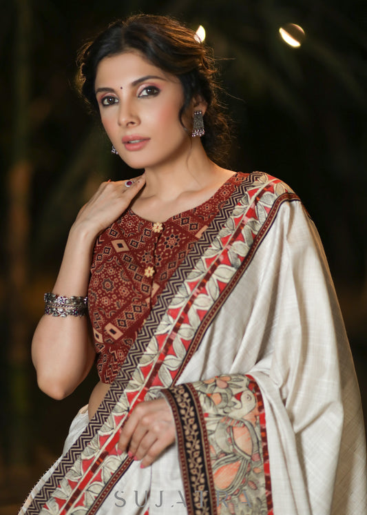 Smart Cream Cotton Blend Saree with Handpainted Madhubani Border Highlighted with Ajrakh Detailing