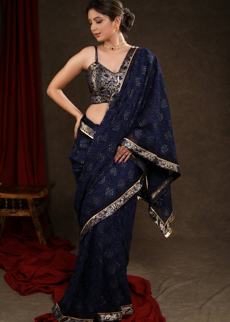 Exquisite Midnight Blue Embroidered Saree Highlighted with Banasari Border