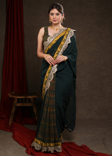 Stylish Emerald Green Georgette & Ajrakh Combination Saree Highlighted with Beautiful Lace