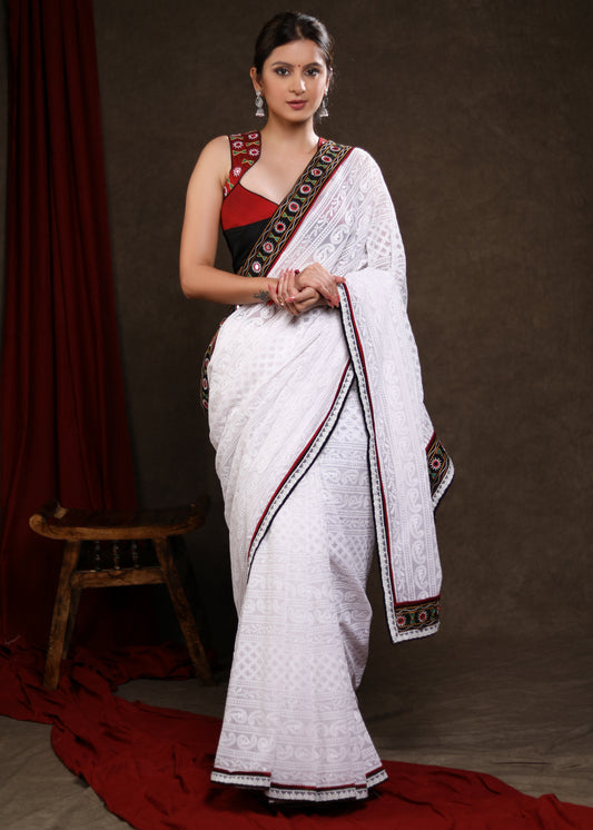 Heavy Chikankari Work Georgette White Saree Highlighted with Elegant Mirrorwork Lace