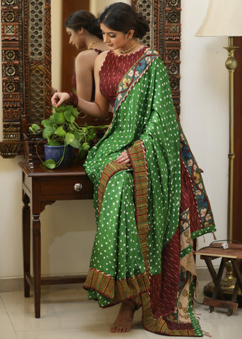 Gorgeous green Gajji Silk Bandhej saree with Kalamkari hand painted Pallu & line border