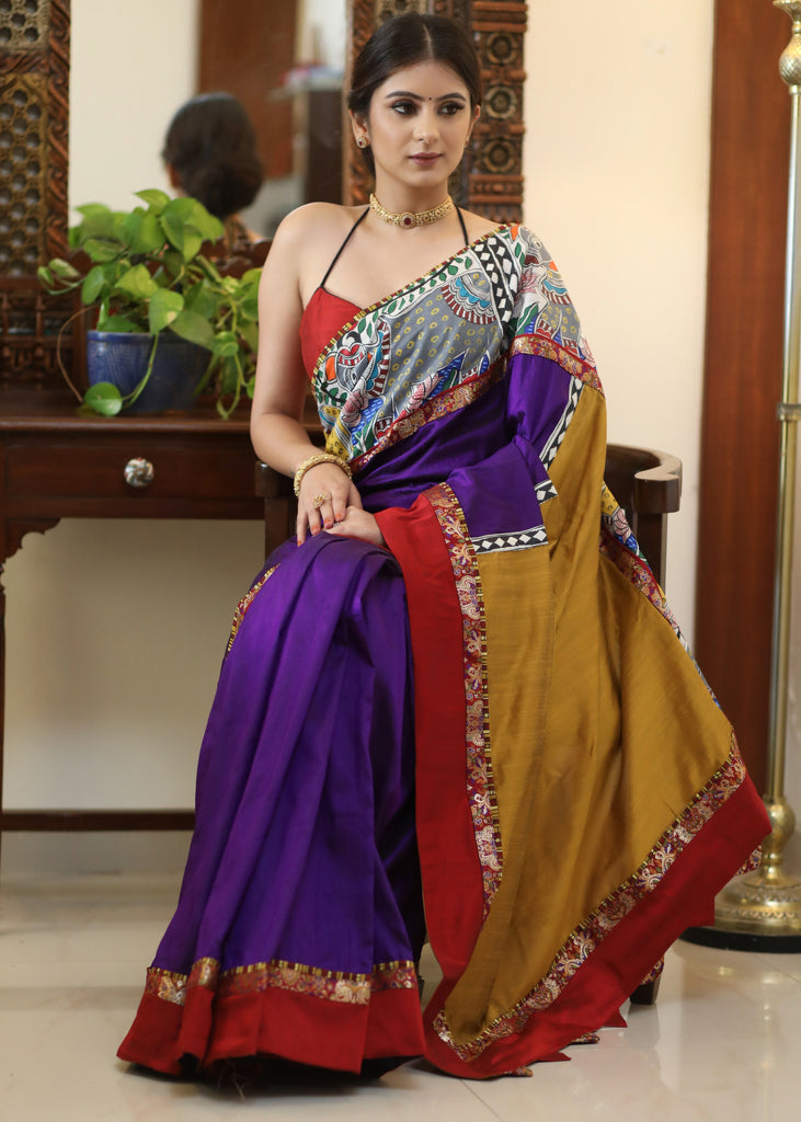 Regal purple Raw silk saree with traditional Kalamkari painted bored, mustard Pallu and marron border
