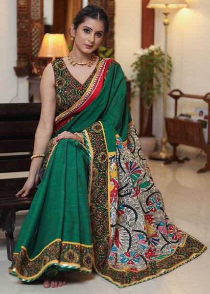Exclusive green Cotton saree with beautiful Madhubani painted Pallu and Ajrakh border