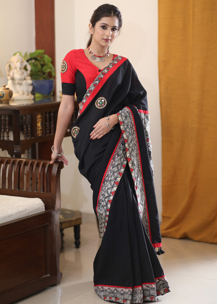 Regal black Cotton saree with Madhubani painted Pallu and border highlighted with mirror work