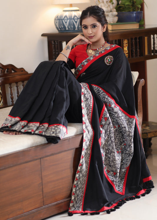 Regal black Cotton saree with Madhubani painted Pallu and border highlighted with mirror work