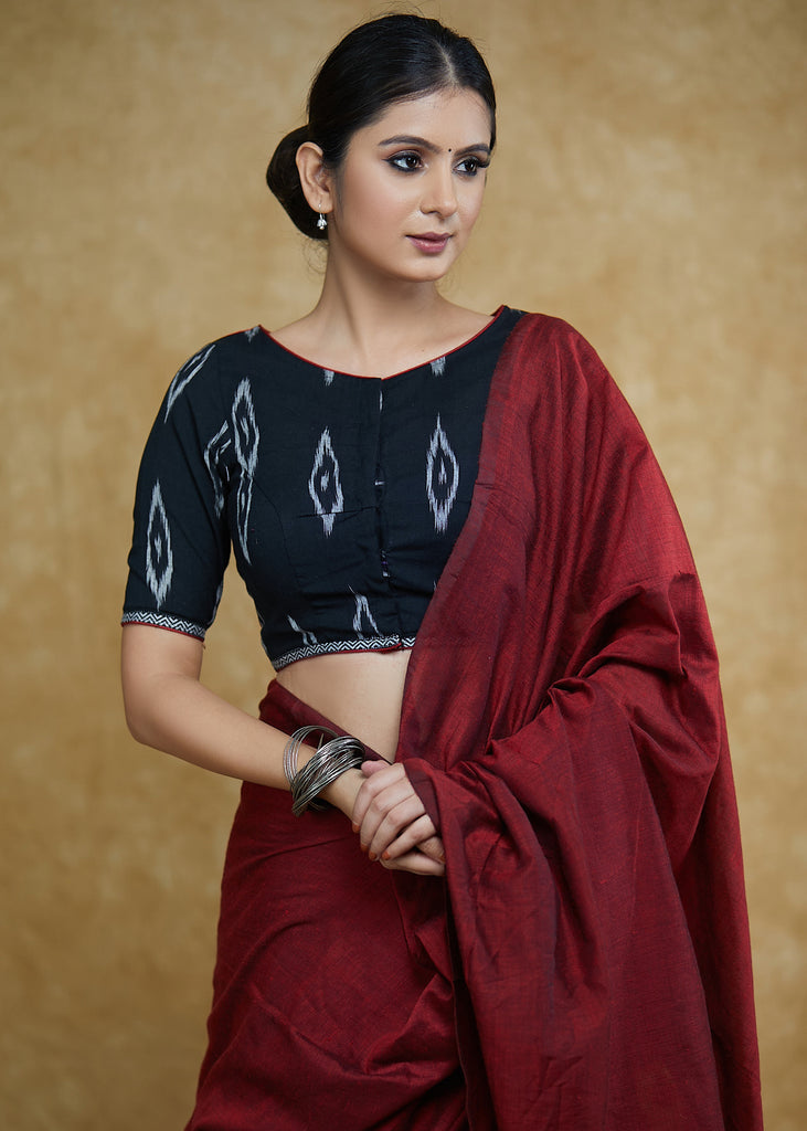 Elegant Black Cotton Ikaat Blouse with Elbow Length Sleeves &Maroon Detailing at the Back