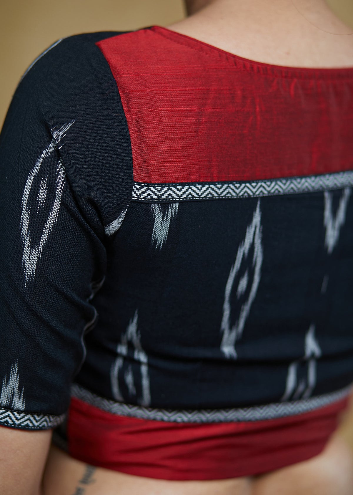 Elegant Black Cotton Ikaat Blouse with Elbow Length Sleeves &Maroon Detailing at the Back