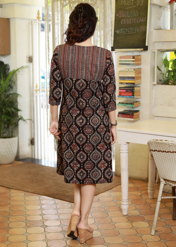 Exclusive Black Cotton Mughal Print Ajrakh A-Line Dress Highlighted with Coins on Neckline