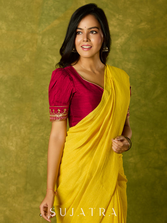 Elegant hand embroidered festive blouse in dark magenta cotton silk.