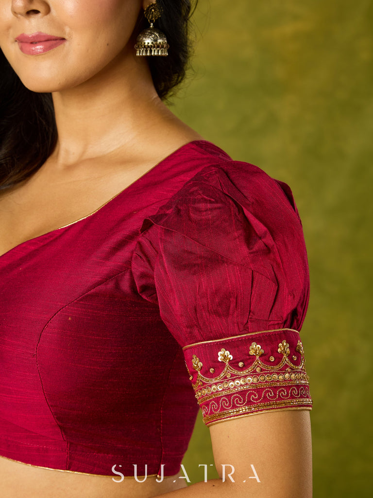 Elegant hand embroidered festive blouse in dark magenta cotton silk.