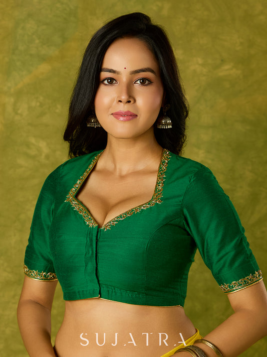 Gracefully hand embroidered forest green cotton silk blouse.