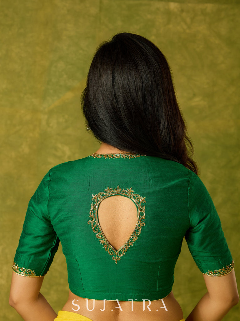 Gracefully hand embroidered forest green cotton silk blouse.