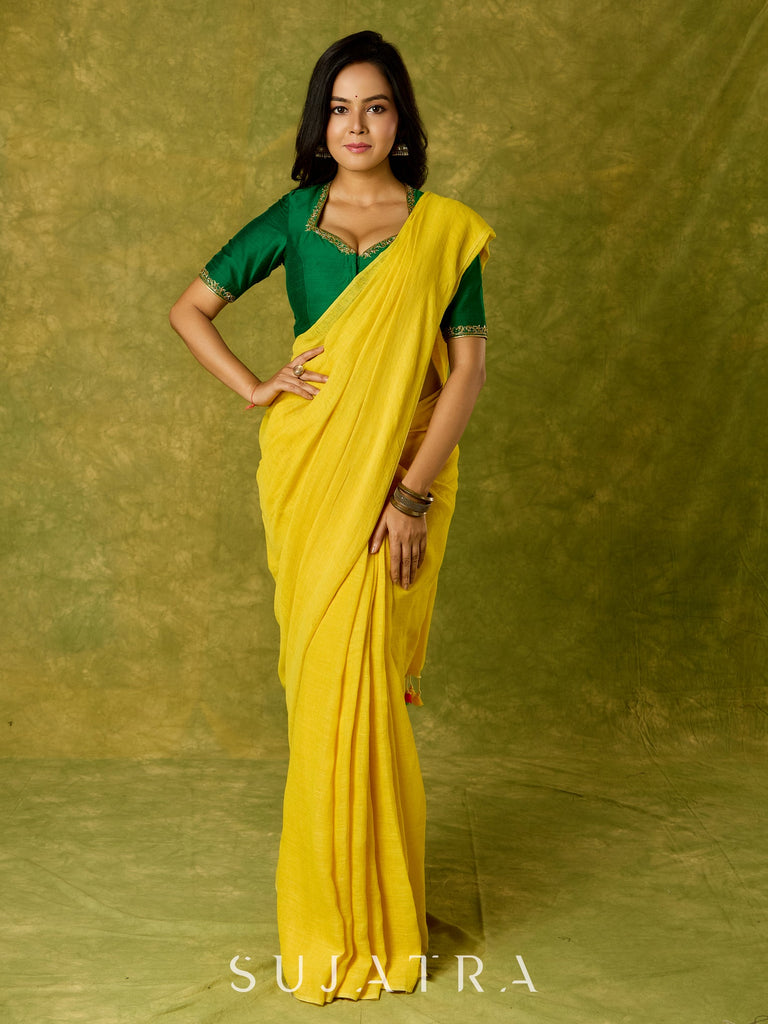 Gracefully hand embroidered forest green cotton silk blouse.