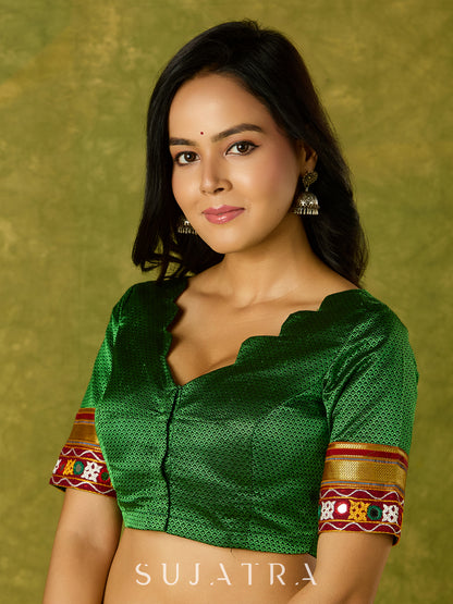 Elegant green khun blouse exuding festive flair and tradition.