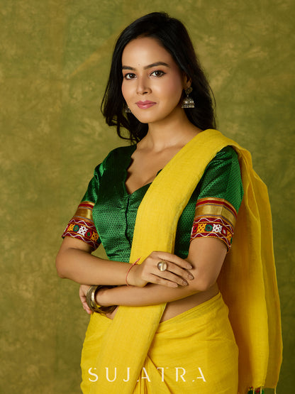 Elegant green khun blouse exuding festive flair and tradition.