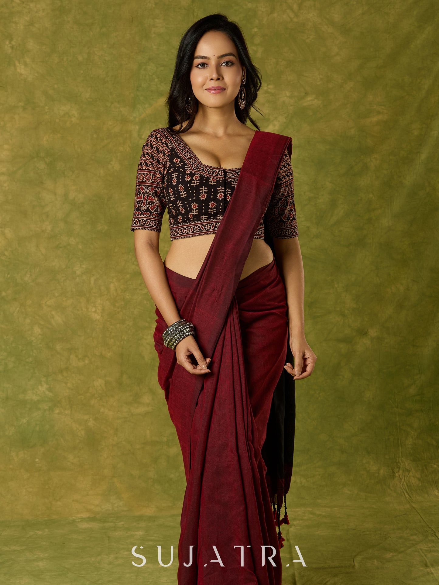 Artfully crafted cotton blouse with rich Ajrakh  accents.