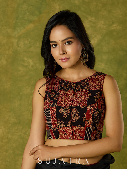 Contemporary sleeveless patchwork blouse